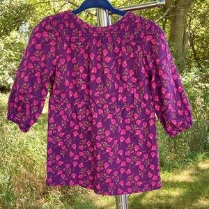 Peek: 12-18 months purple dress w/ pink flowers and smocking.
